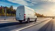 © alphaspirit - White delivery van races along a highway as the sun sets