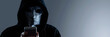 © john - Hacker Anonymous and face mask with smartphone in hand. Man in black hood shirt holding and using mobile phone on white background. Represent cyber crime data hacking or stealing personal data concept