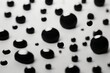 © CJ - Photography of a black and white splash dots design, emphasizing its eye-catching and relaxing qualities, suitable for a light background wallpaper with copy space.