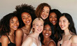 © piai - Group of diverse multiracial and multi ethnic smiling woman posing in a studio