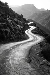 winding black and white road