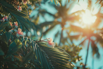 Wall Mural - A close-up of tropical foliage and flowers with sunlight filtering through, creating a warm and vibrant atmosphere