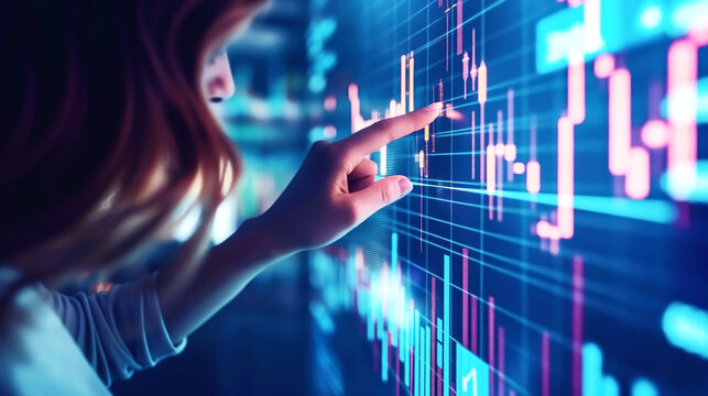 Close-up of a woman analyzing financial data on a digital screen with glowing charts.