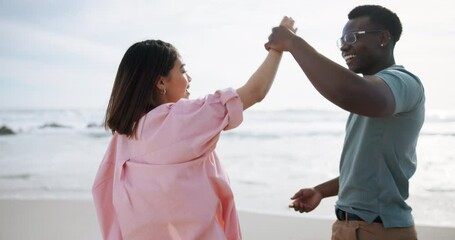 Poster - Couple, outdoor and dancing with love by ocean for freedom on romantic holiday, travel and bonding in California. Man, woman and together with movement on vacation by beach waves, happy and support.