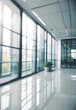 © StudioSocietal - blurry modern glass office space background
