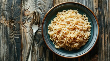 Wall Mural - Eating brown rice with cutlery