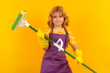 Wall Mural - Child helping to clean. Child mopping house, cleaning home. Detergents and cleaning accessories. Cleaning service. Little boy housekeeping.