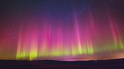 Poster - A vibrant Aurora Borealis display in the night sky over a field.