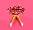 © New Africa - Woman with lips instead of head on pink background. Stylish art collage