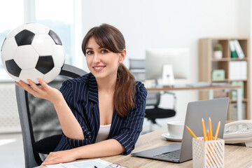 Sticker - Smiling employee with soccer ball at table in office