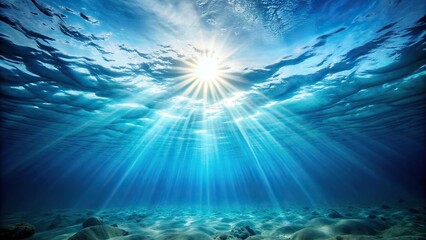 Wall Mural - Underwater view of sun rays shining through sea water surface with blue sky , underwater, sun rays, sea water, surface
