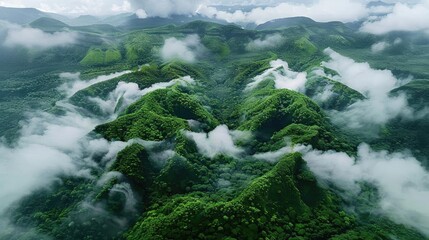 Poster - Aerial view of lush green mountains with clouds, showcasing breathtaking natural beauty and serenity.