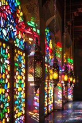 Poster - Islamic lanterns with stained glass panels, casting colorful patterns when illuminated.