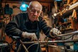 © Olsek - Elderly man working on a bicycle in a workshop with various tools. The image depicts craftsmanship and dedication in a home setting. Perfect for illustrating hobbies or DIY projects. Generative AI