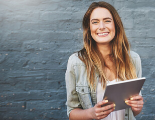 Poster - Portrait, smile and tablet with designer woman on brick wall background for creative research. Project management, space and technology with happy employee outdoor for professional web development