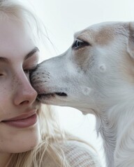 Poster - A woman is hugging a white dog with blue eyes