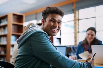 Poster - University student, man and happy with portrait in library for writing, scholarship and studying for exam knowledge. Gen z, person and smile for learning, education and research notes for assessment