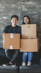 Poster - A couple is posing with boxes in front of a wall