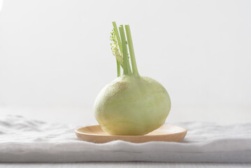 Wall Mural - Fresh raw green kohlrabi with leaf on white background, Vegetable from Organic farm ingredient for cooking healthy or vegetarian food in spring and summer season