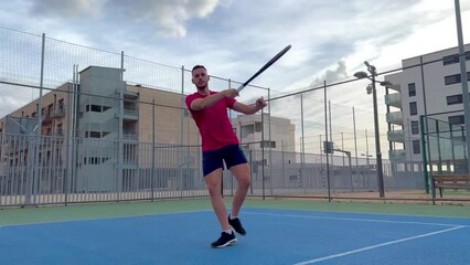 Wall Mural - video of man playing tennis