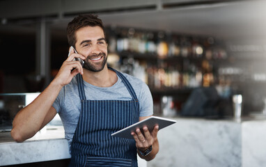 Canvas Print - Happy man, waiter and phone call with tablet for online order, conversation or discussion at indoor cafe. Male person or barista talking with smile or technology on mobile smartphone for reservation