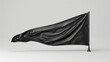 © vefimov - A black flag blowing in the wind, suitable for use as a symbol of protest or rebellion