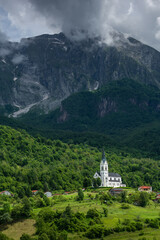 Wall Mural - Scenic Slovenian Countryside: Dreznica Village with Mount Krn in Background