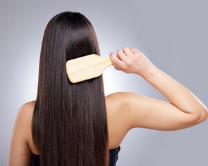 Sticker - Woman, back and hair care in studio for brush, hairdresser and beauty salon on white background. Girl, comb and hairstyle with healthy texture, wellness or treatment with growth transformation