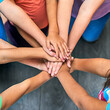 © Arnell K/peopleimages.com - Children, hands and together for solidarity, trust and achievement for growth in education. Students, kids and school for teamwork, support and development with huddle for commitment by above