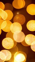 Wall Mural - Gold bokeh lights and sparkles, abstract defocused background, vertical video