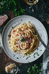 Canvas Print - A plate of spaghetti with crispy bacon and melted parmesan cheese