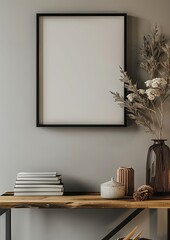 Wall Mural - photorealistic mockup of an empty black frame on the wall above a shelf, grey walls