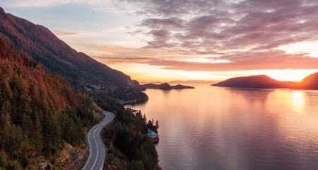 sea to sky highway on west coast of pacific ocean. cloudy sunset sky.