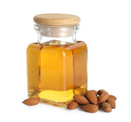 Wall Mural - Bottle of almond oil and fresh nuts isolated on white