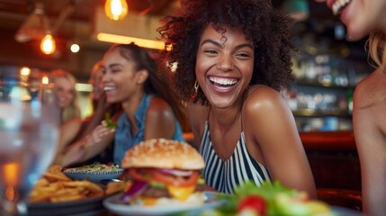 Wall Mural - A woman is smiling and eating a hamburger in front of a group of people