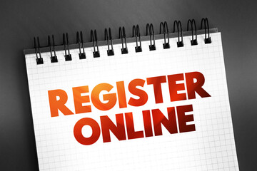 Poster - Register Online text on notepad, concept background