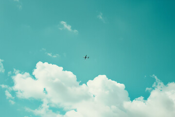 photo of blue sky with clouds and airplane flying in the distance, in the style of unsplash photogra
