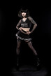 © Michael - Beautiful goth punk model in studio on black background