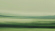 © Nataliia - Abstract green motion background with a soft gradient ranging from a pale green to more subdued grayish tone