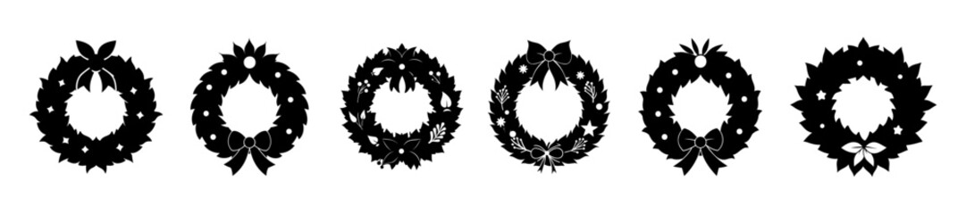 Wall Mural - Black silhouettes of Christmas wreaths isolated on a white background. Graphic illustration. Concept of minimalist holiday decor and seasonal greetings. Suitable for print and design elements