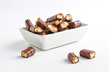 Poster - Chocolate Covered Nuts in White Bowl