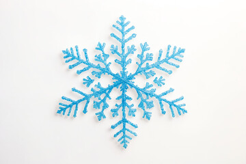 Wall Mural - Blue Snowflake on White Background