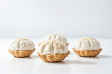 Sticker - White Chocolate Tartlets on a White Background