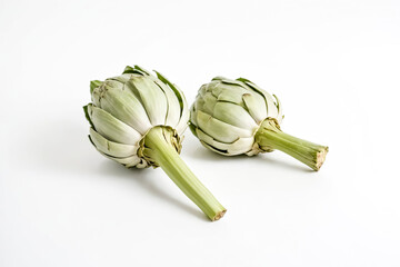 Wall Mural - Two artichokes on a white background