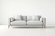 © Rysak - Minimalist White Sofa on White Wooden Floor in Front of White Wall