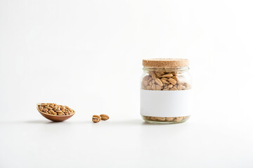 Poster - Glass Jar with White Label and Brown Beans on White Background