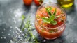 © Yelena - Gazpacho in a glass garnished with fresh herbs image