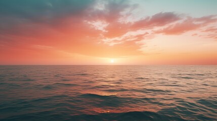 Poster - serene sunset over the ocean, with the sky reflecting the soft hues of the setting sun, creating a tranquil and peaceful atmosphere