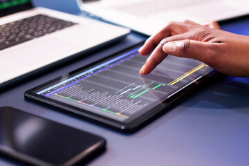 Poster - African American woman using Gantt software to manage project schedule