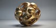 © Vitaliy - Modern metallic gold sculpture with organic balls
